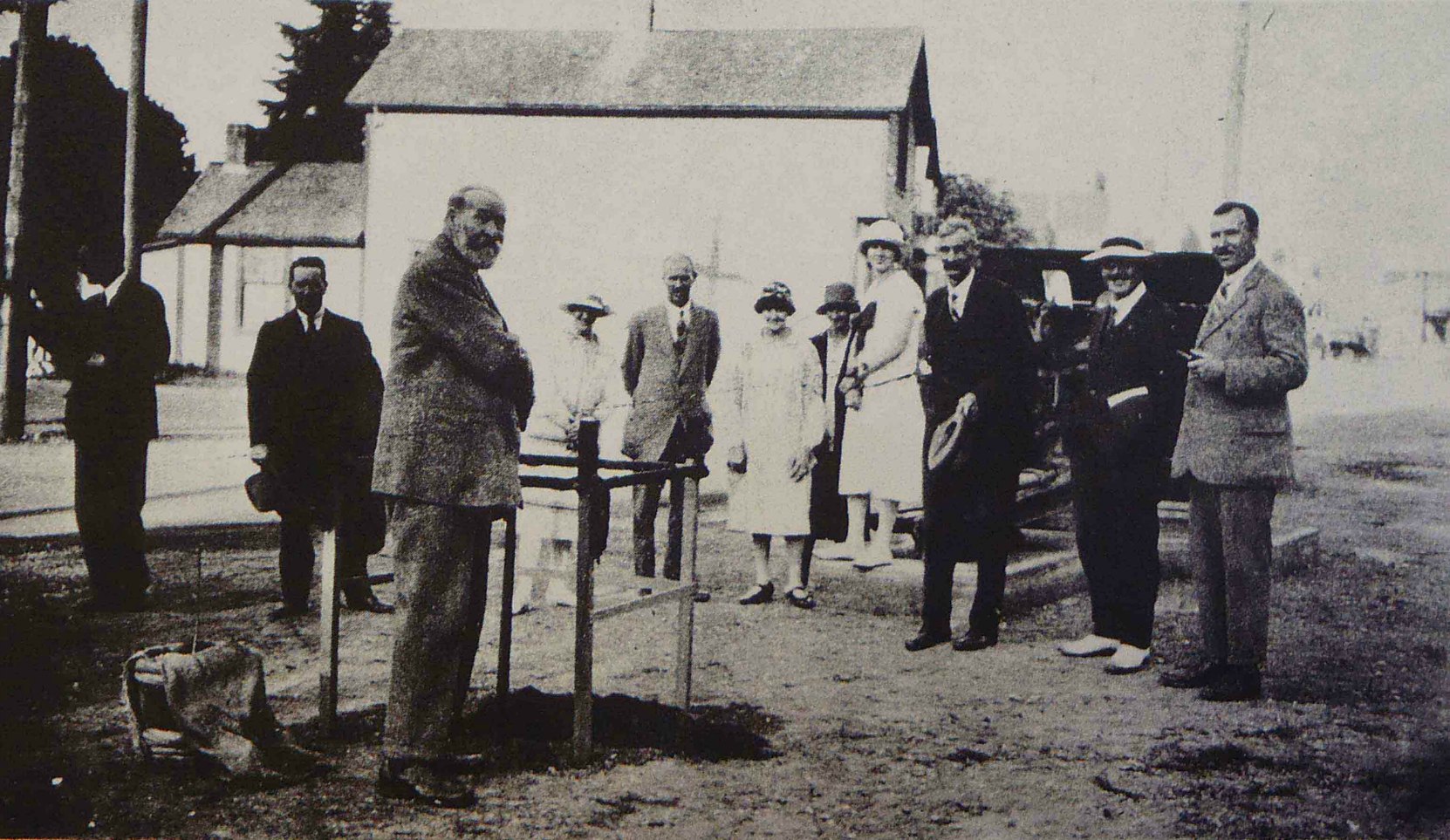 David Alexander planting the Confederation Tree, Government Street, Duncan, B.C. on 1 July 1927.