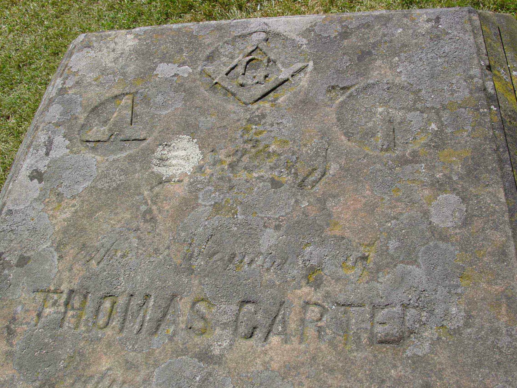 Masonic imagery, the Square & Compasses, the Level and the Plumb, on the Thomas Carter grave marker, Pioneer Square, Victoria, B.C.