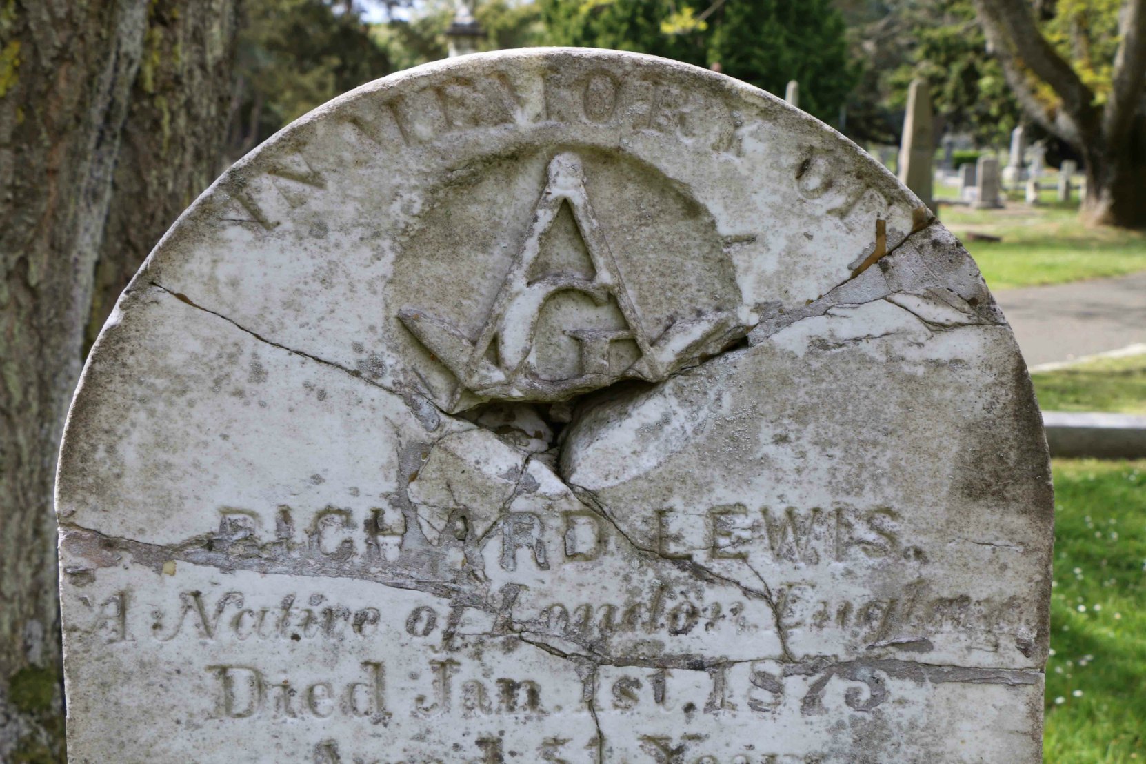 Repaired vandalism damage on Richard Lewis' gravestone, Ross Bay Cemetery, Victoria, B.C.