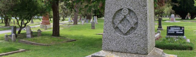 web header photo showing Masonic Square & Compasses on a gravestone in Ross Bay Cemetery