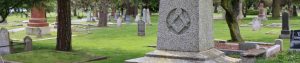 web header photo showing Masonic Square & Compasses on a gravestone in Ross Bay Cemetery