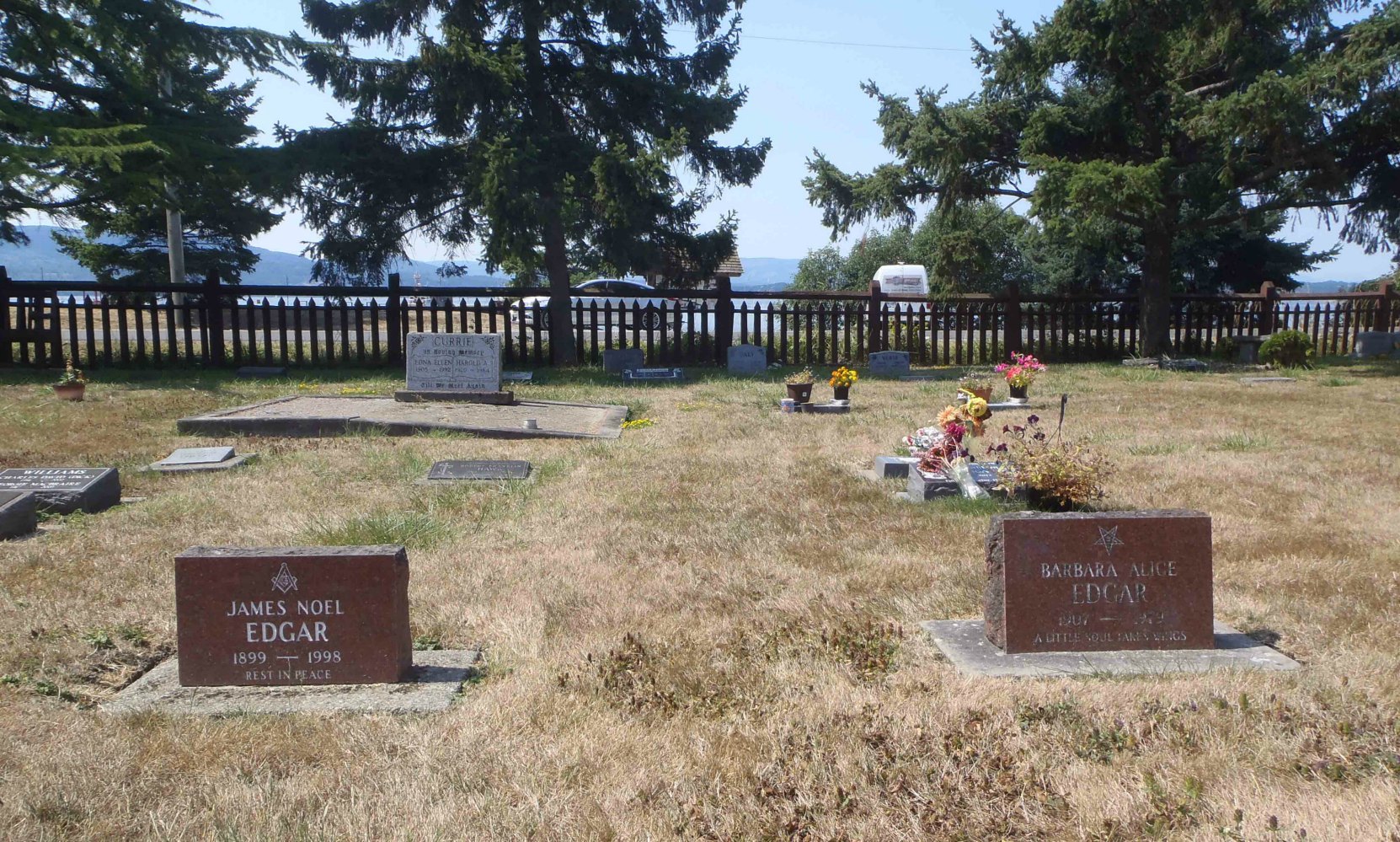 James Noel Edgar and Barbara Alice Edgar grave markers, Holy Trinity Anglican cemetery, North Saanich, B.C.