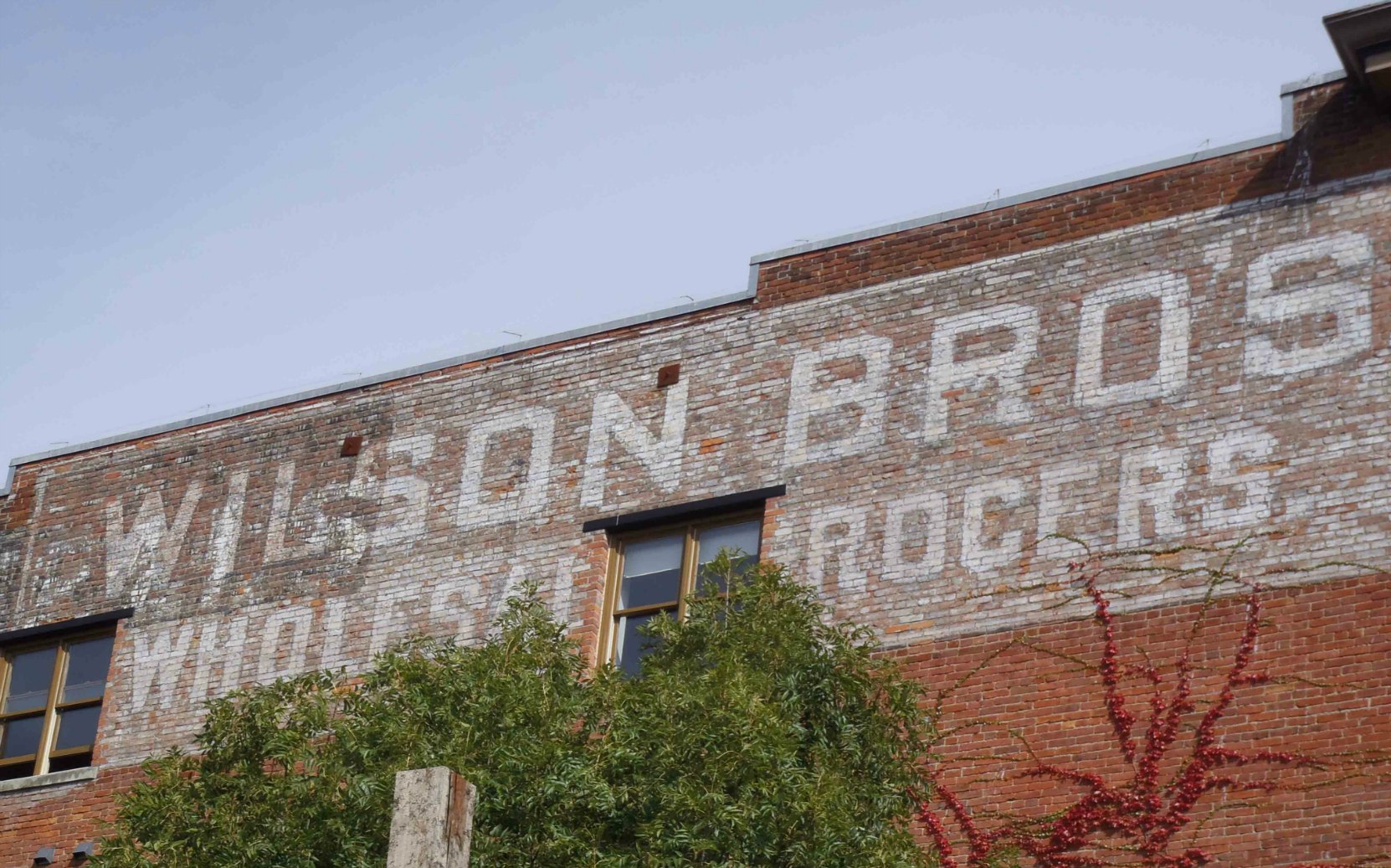 532 Herald Street, built in 1908-1909 as a warehouse for Wilson Brothers. The Wilson Brothers sign is still visible on the west side of the building.