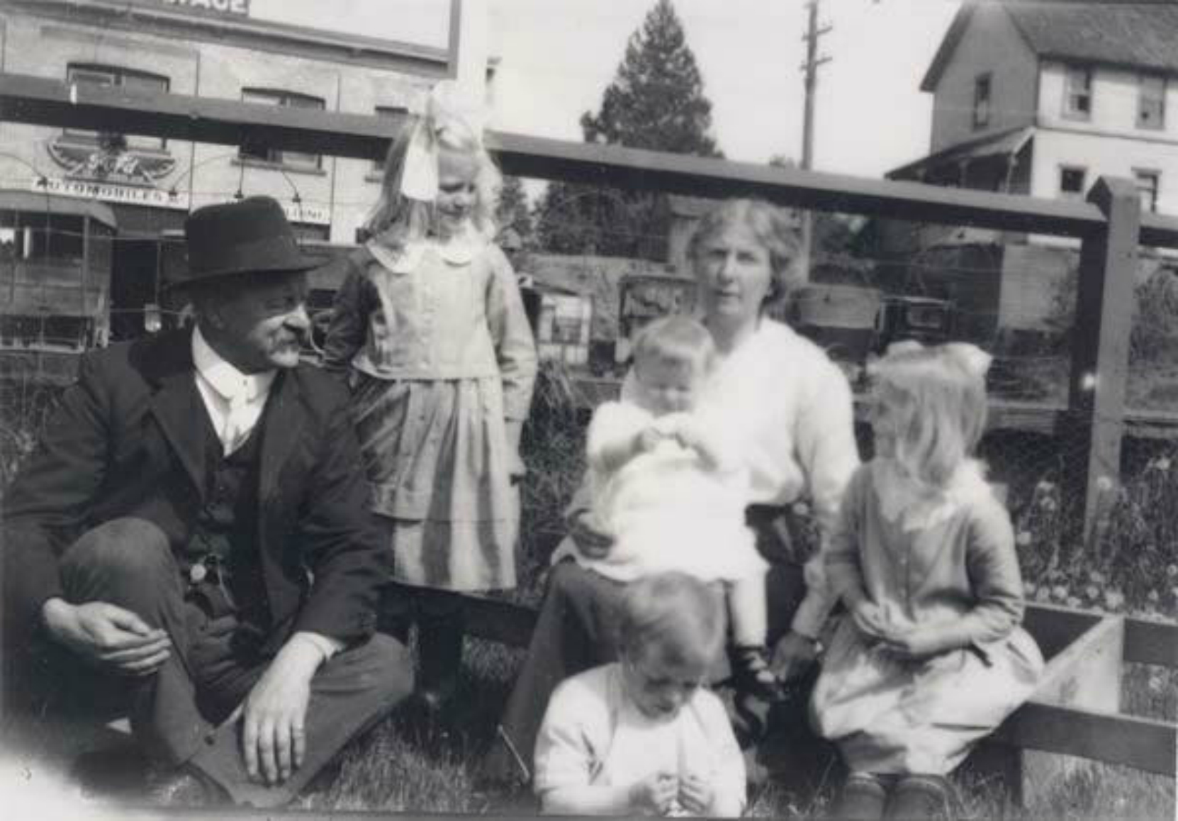 Roland Clayton Fawcett and his family outside the E&N Station, Duncan, 1922. The Duncan Garage is in the left background. The building on the right background is the Alderlea Hotel(now demolished) once owned by Charles Herbert Dickie. (Photo: Cowichan Valley Museum & Archives)