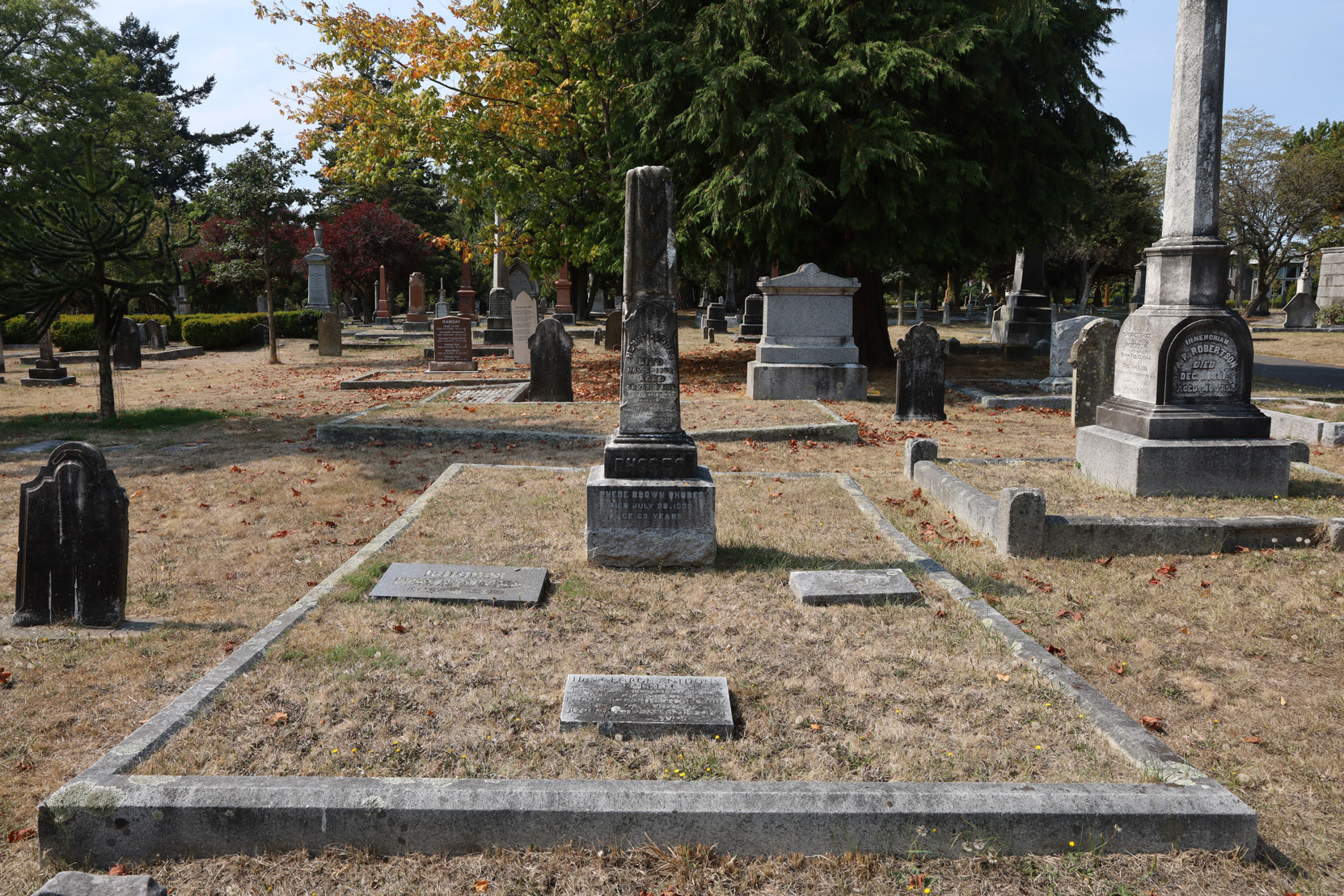 George Anthony Walkem gravestone (foreground) in the Rhodes family plot, Ross Bay Cemetery, Victoria, BC (photo: Temple Lodge No. 33 Historian)